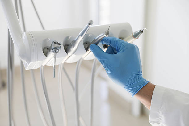 Professional Tooth Extraction technician working in Commerce, TX